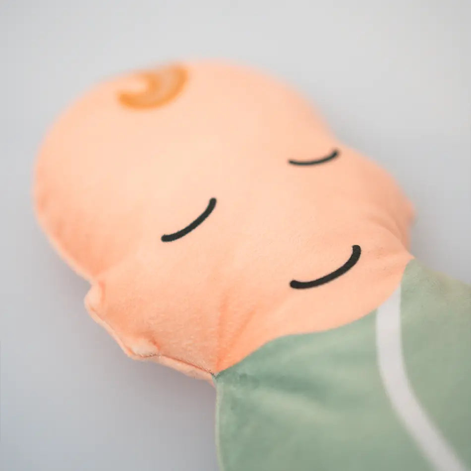 Een close-up van een newbornportretje met ogen dicht